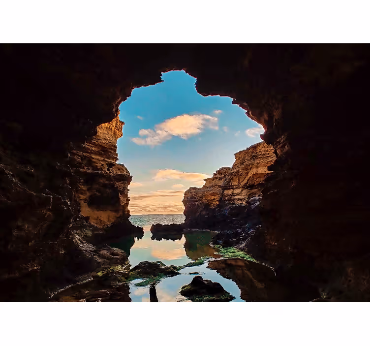 Tapisserie paysage vue sur mer depuis une grotte - TenStickers