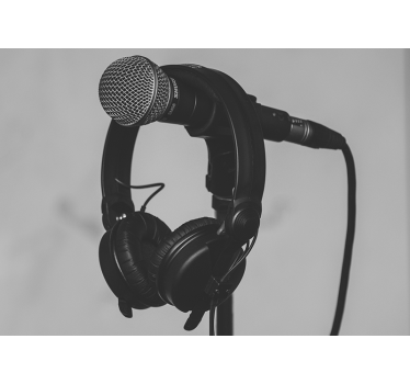 Store enrouleur gris microphone et écouteurs - TenStickers
