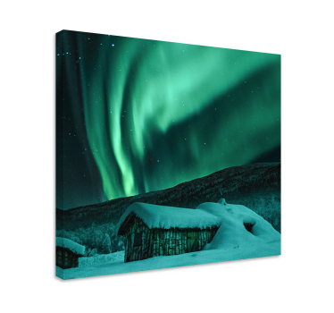 Tableau avec des aurores boréales au-dessus d'un chalet enneigé - TenStickers