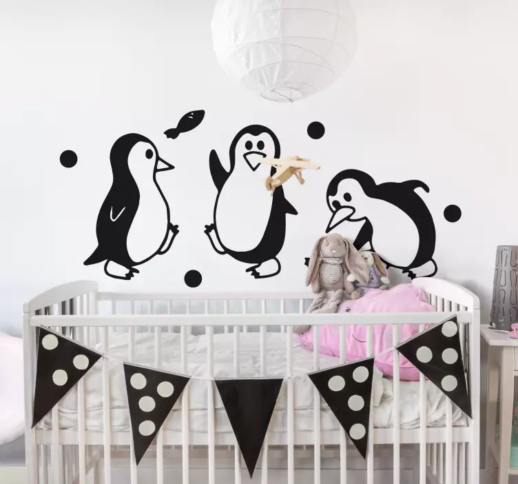 Sticker chambre enfant famille de pingouins joueurs - TenStickers