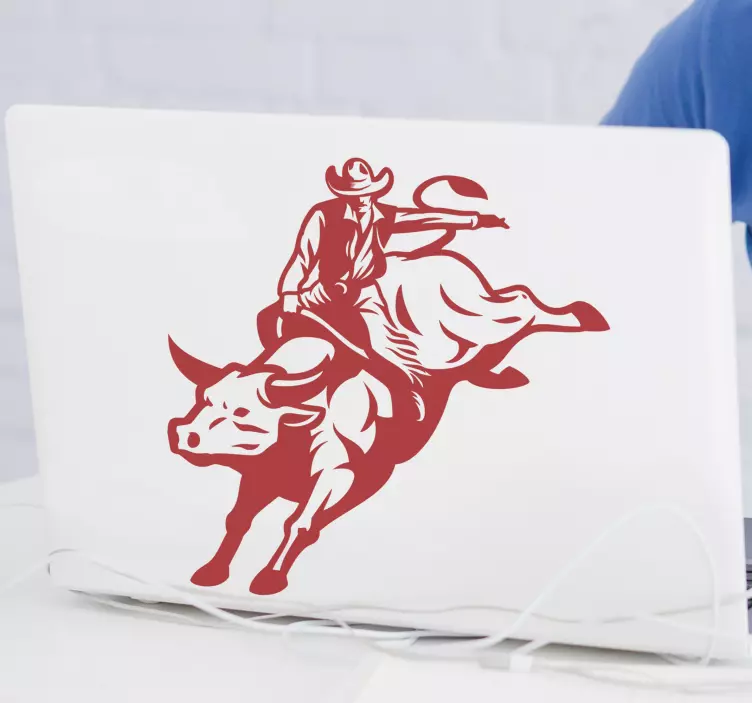 Sticker ordinateur cow-boy chevauchant un taureau - TenStickers