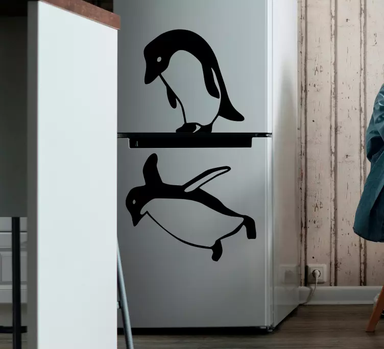 Sticker frigo couple de pingouins - TenStickers