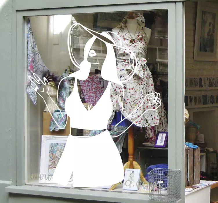 Sticker vitrine silhouette de femme élégante - TenStickers