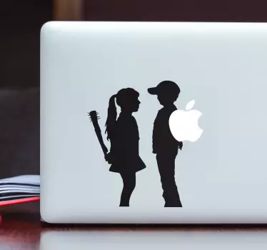 Sticker Macbook  garçon et fille Banksy - TenStickers