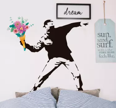 Sticker graffiti de la révolution de Banksy avec fleurs - TenStickers