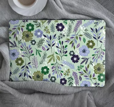 Sticker ordinateur portable fleurs violettes sur fond vert - TenStickers