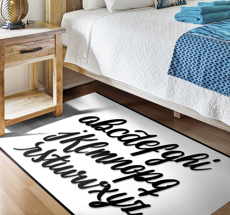 Tapis vinyle alphabet lettres noires et blanches - TenStickers